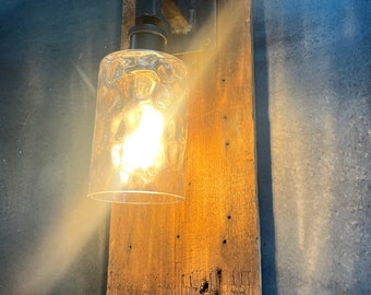 Barn wood wall sconce with hammered glass globe.