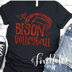 May include: Black t-shirt with red glitter text that reads "BISON VOLLEYBALL" with a volleyball and hearts. The text "Love Notes by JP" is in the bottom right corner.