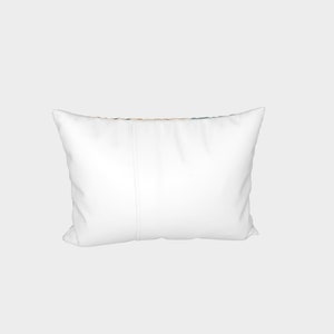 May include: White rectangular pillow with a seam down the center.