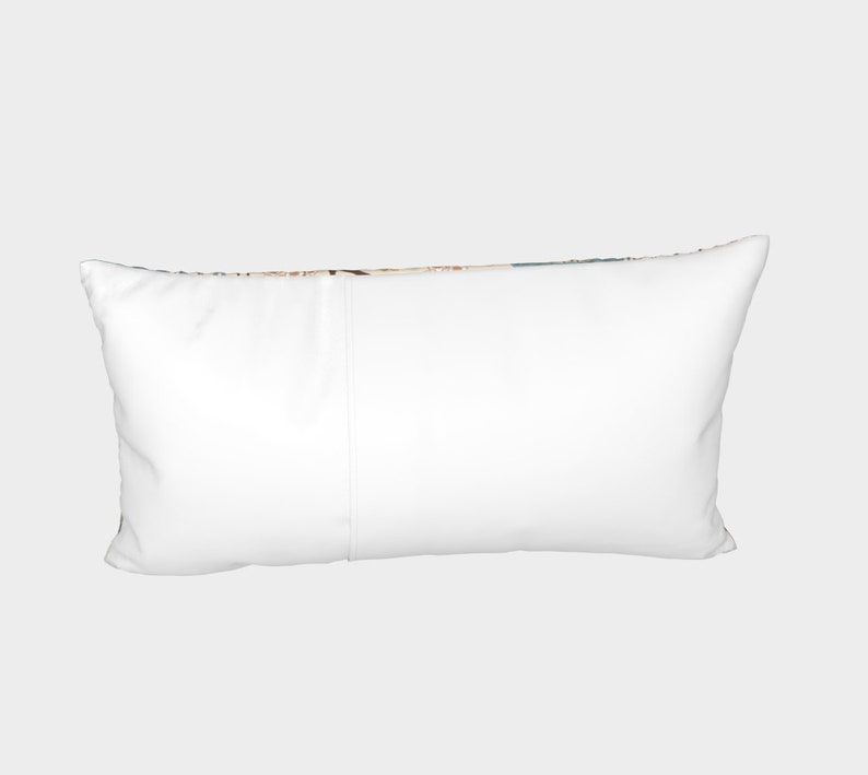 May include: A white rectangular pillow with a zipper closure. The pillow is lying flat on a light gray background.