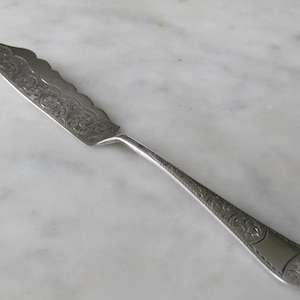 Butter Spreader  English Sterling Silver 1924-   (107856E)