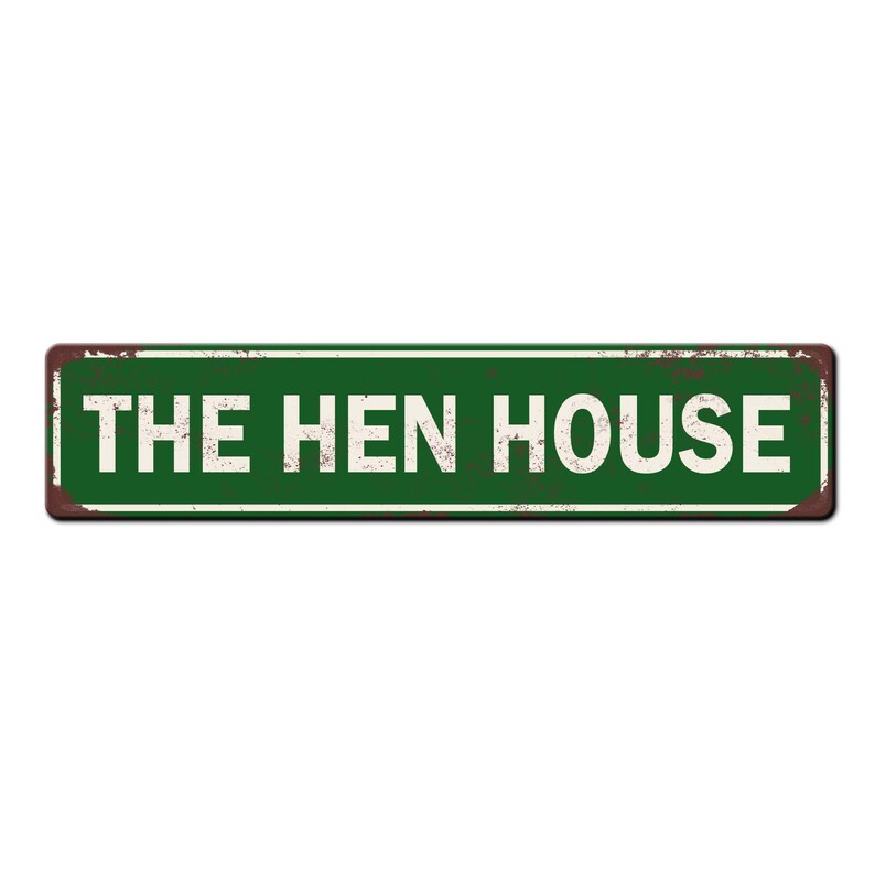 May include: A green metal sign with rusty edges and white text that reads "THE HEN HOUSE".