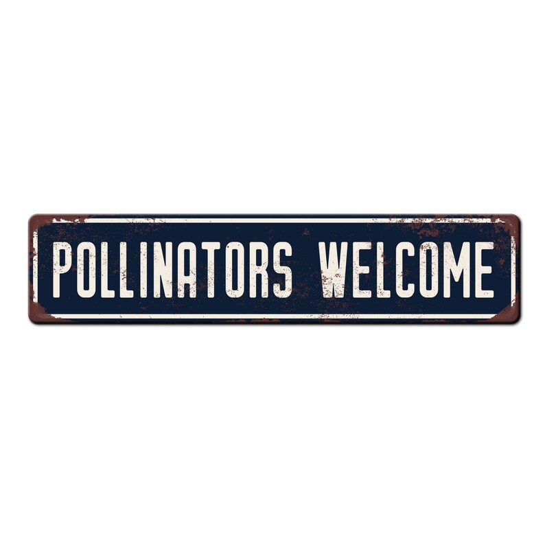 May include: A blue metal sign with white text that reads "Pollinators Welcome". The sign has a rustic, weathered look.