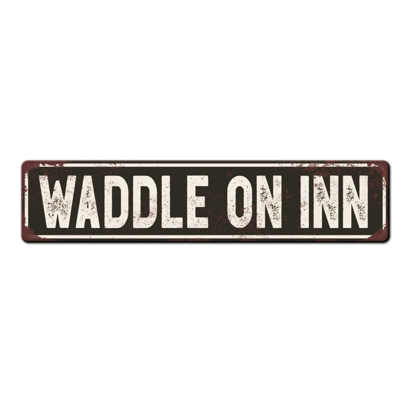 May include: A rusty metal sign with the text "Waddle On Inn" in white letters on a black background.