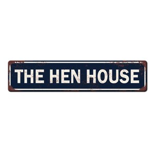 May include: A blue and white metal sign with the text "THE HEN HOUSE" in white lettering.