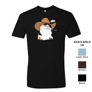 May include: Black t-shirt with a cartoon image of a calico cat wearing a cowboy hat and holding a piece of grass in its mouth. The cat is looking to the right and the text "MEOWDY!" is above the cat. The t-shirt is available in light blue, brown, and black.