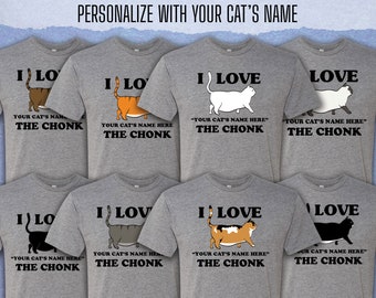 May include: Six gray t-shirts with different colored cats printed on them. Each shirt says "I Love The Chonk" and has a space to add your cat's name.
