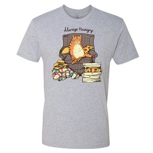 May include: A gray t-shirt with a graphic of an orange cat sitting in a chair with a pizza and other food around it. The text "Always Hungry" is above the cat.