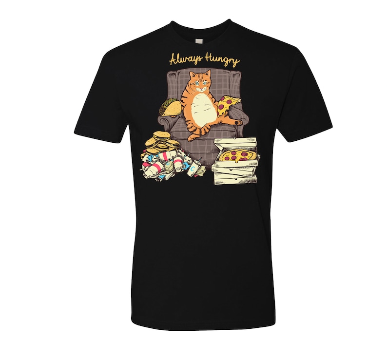 May include: A black t-shirt with a graphic of a cartoon orange cat sitting in a chair with a pizza and a taco. The text "Always Hungry" is above the cat.