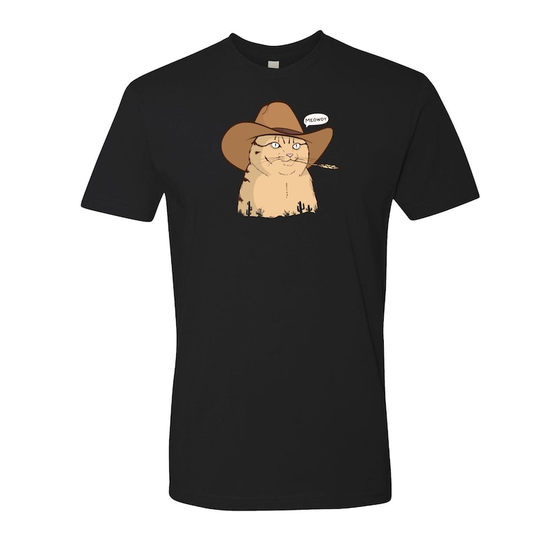 May include: A black t-shirt with a cartoon image of a cat wearing a cowboy hat and saying "MEOWEY!"