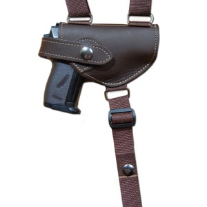 Holster cuir marron pour pistolet mais de quelle origine