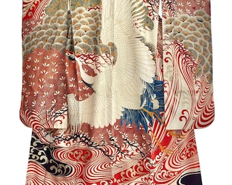May include: A traditional Japanese kimono featuring a large white crane with outstretched wings. The kimono has a cream background with red, blue, and black accents. The design includes stylized waves, trees, and other natural elements.