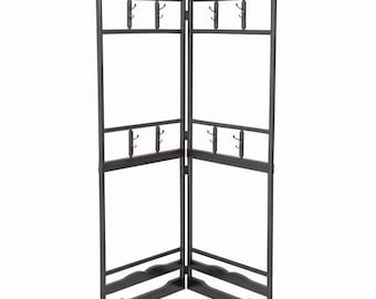 May include: A black metal coat rack with multiple hooks and a two-panel design. The rack is freestanding and has a decorative base.