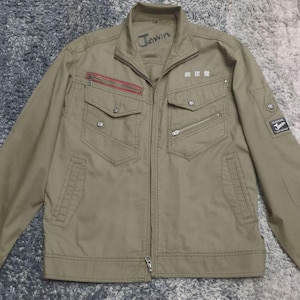 Vintage japansk fabriksarbetarjacka storlek XL brunt företagsnamn broderat