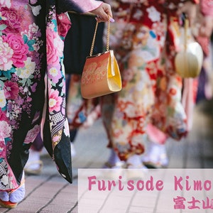 May include: A group of people wearing traditional Japanese Furisode Kimono with floral patterns. The kimonos are in shades of pink, red, and black. The people are walking down a street.