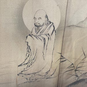 May include: A black and white illustration of a man in a robe sitting with his legs crossed. He is surrounded by a light gray background with a circle behind him.