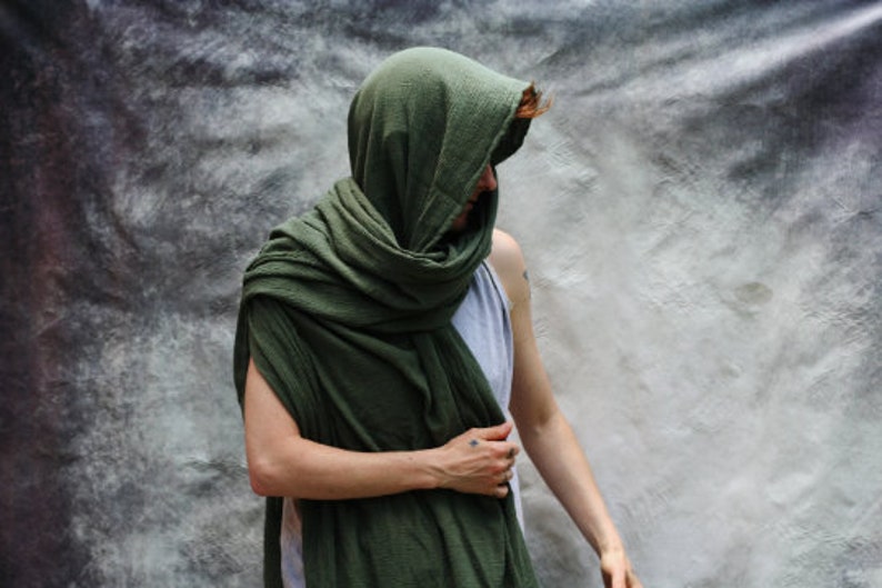 the apocalyptic cloak is wrapped as a hood and chest drape