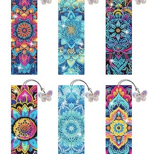 May include: Six colorful diamond painting bookmarks with butterfly charms. Each bookmark features a different mandala design with intricate details and vibrant colors.