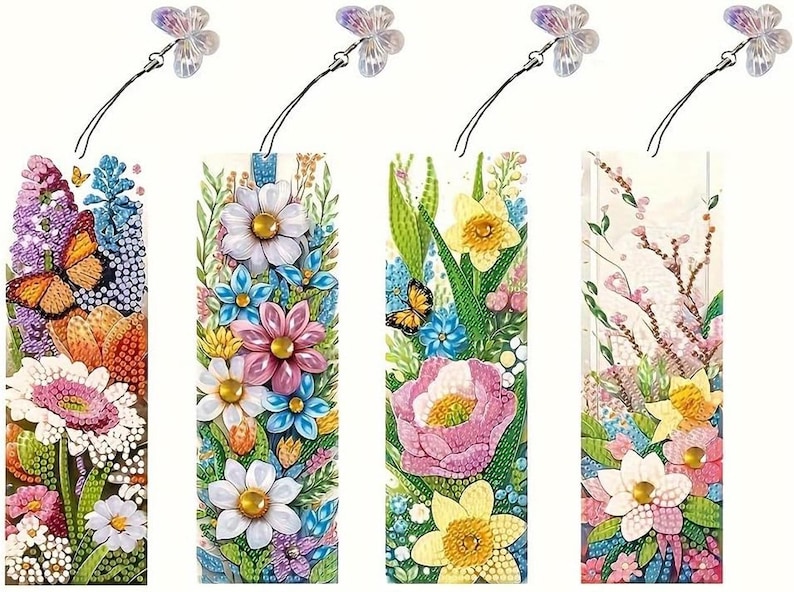 May include: Four colorful floral bookmarks with a butterfly charm. Each bookmark features a different floral design with a variety of flowers, including daisies, roses, and lilies.