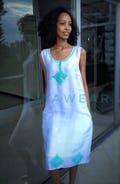 White saba dress with turquoise embroidey product logo