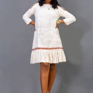 Gabi dress with embroidery.