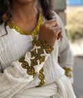 Golden neckline habesha dress product logo