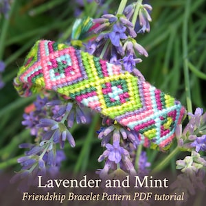 May include: A colorful friendship bracelet with a lavender and mint pattern. The bracelet is made with embroidery floss and is resting on a sprig of lavender flowers. The text "Lavender and Mint Friendship Bracelet Pattern PDF tutorial" is displayed below the bracelet.