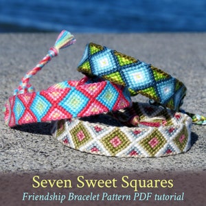 May include: Three friendship bracelets with a geometric pattern of squares in shades of blue, green, pink, and white. The bracelets are stacked on top of each other and the text "Seven Sweet Squares Friendship Bracelet Pattern PDF tutorial" is below the bracelets.