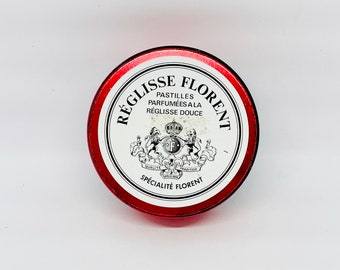 Pastilles françaises Reglisse Florent vintage circulaire en métal rouge, blanc et noir