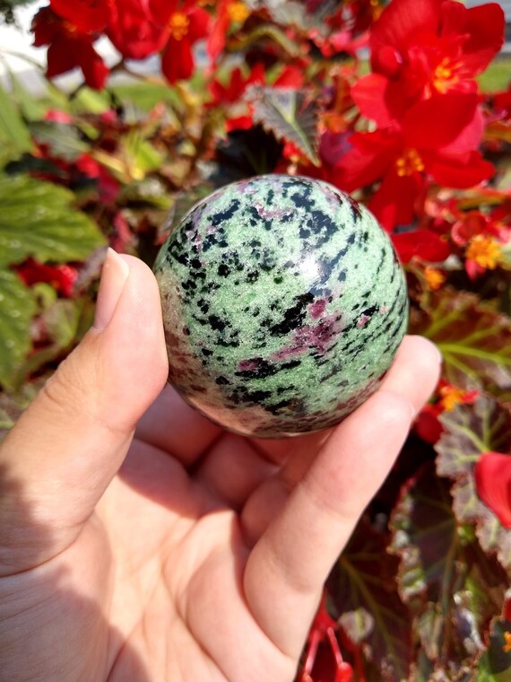 The Fire & Earth Crystal Ruby Zoisite With Mica Sphere UV Reactive