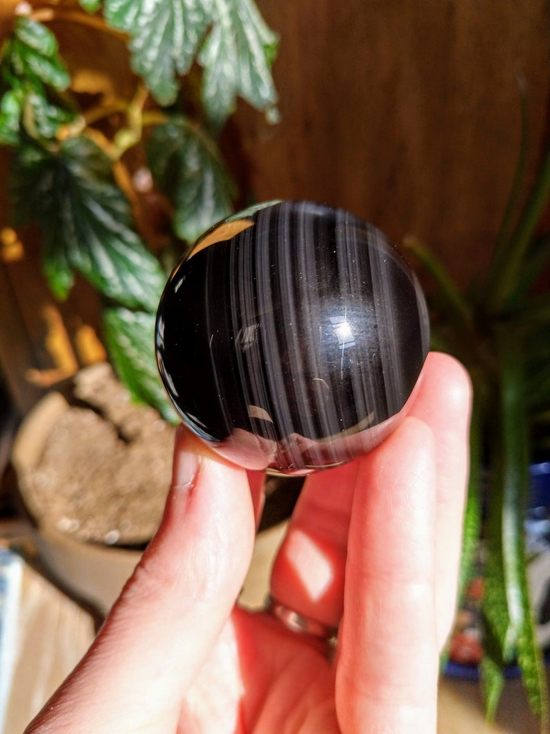 green obsidian orb vs glass green obsidian orb vs glass