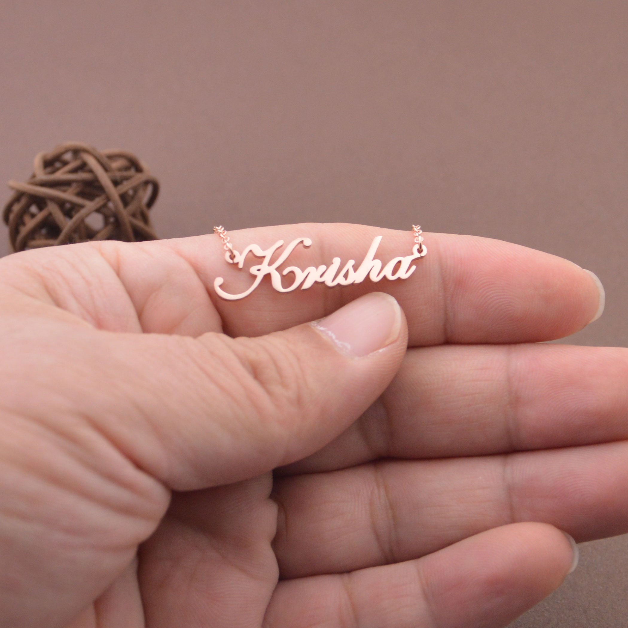 Rashmi clearance name locket