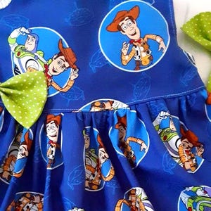 TOY STORY DRESS Woody Buzz Dress Disney Dress Birthday Party Dress 3mo.to6yr. Flutter or Sleeveless made by BabyCuteBaby.etsy.com