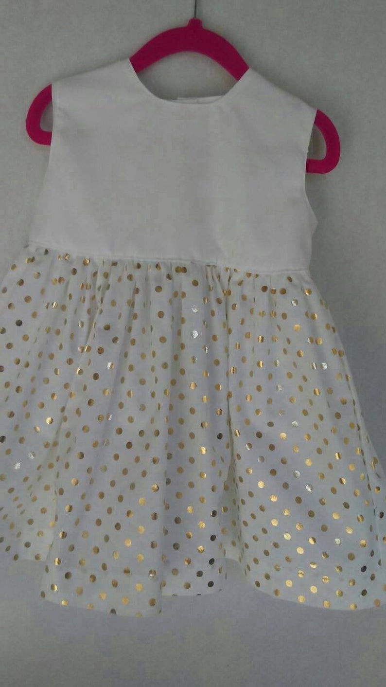 white and gold baby dress