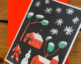 Christmas village riso printed christmas card with neon red envelope