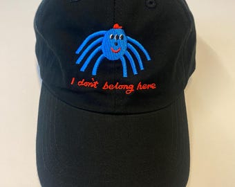 I don’t belong here spider embroidered black baseball cap