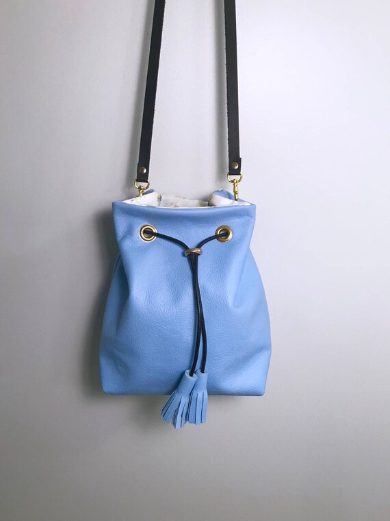 blue leather bucket bag