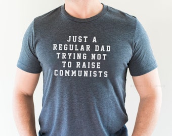 Just a Regular Dad Trying Not to Raise Communists | Dad Shirt | Conservative Gift | Patriot Dads | Unisex T-Shirt