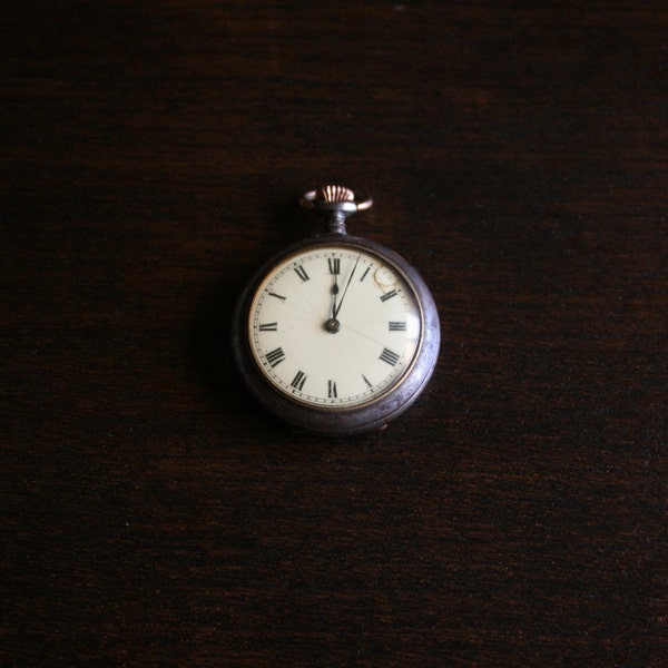 Vintage 1940s Pocket watch. European make with damaskeening. Working movement.