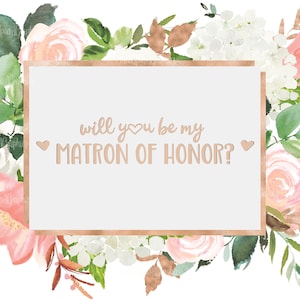 May include: A white card with a gold frame and floral border. The card says "Will you be my Matron of Honor?" with a heart symbol.