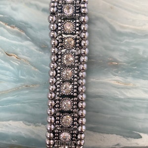 Stretchy Crystal and Silver Tone Bracelet