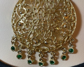 ヴィンテージのエメラルドグリーンとゴールドのネックレス