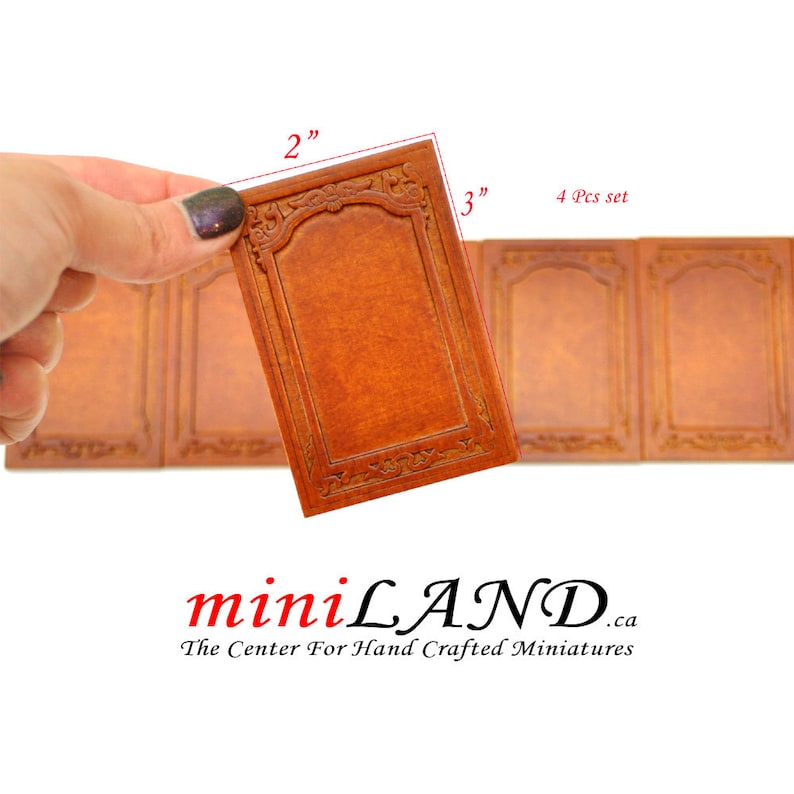 May include: Set of four miniature wood paneling pieces, each measuring 2 inches by 3 inches. The panels are a rich brown color with a decorative carved design around the edges.