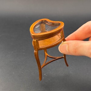A Miniature Display of Heart-shaped Jewelry Wedding Rings Valentine ...