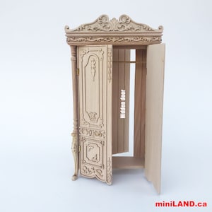A hidden escape door Wardrobe ARMOIRE Victorian carved cupboard with a hidden escape door  handcrafted for 1:12 dollhouse miniatures. V4074