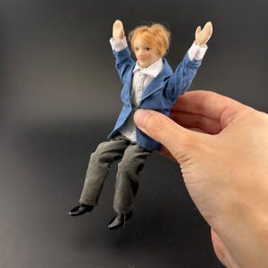 6-Inch  1:12 Scale Male Doll with Movable Limbs & Rotating Head – Non-Removable Clothes, Blue Shirt and gray Pants