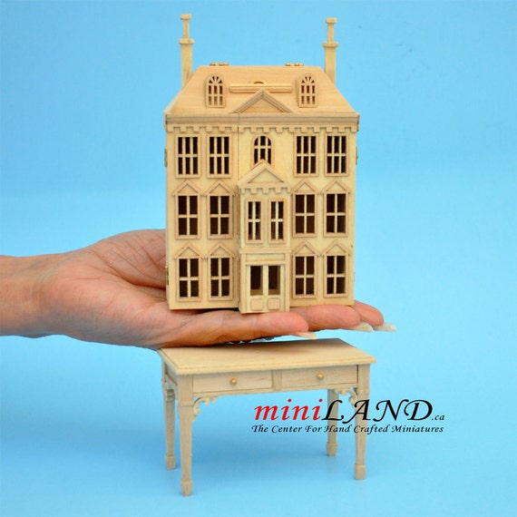 unpainted dollhouse