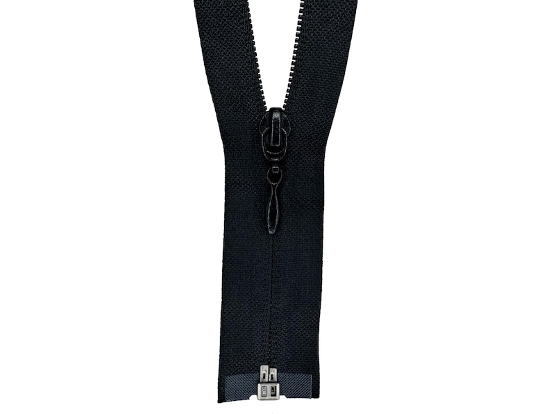 May include: A black zipper with a black slider and silver pull tabs.