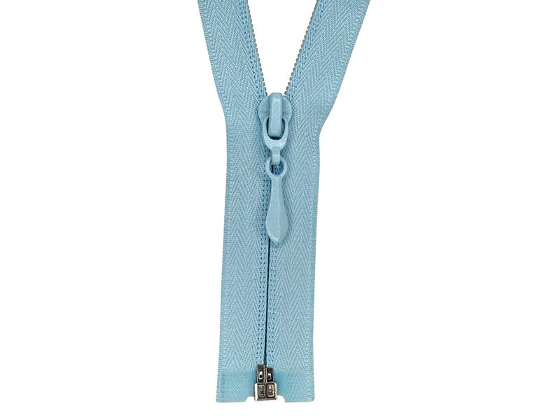 May include: A light blue zipper with a silver slider and pull tab.