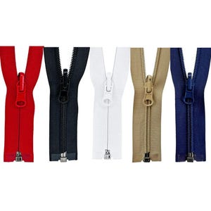 May include: Five different colored zippers with metal sliders. The zippers are red, black, white, beige, and navy blue.